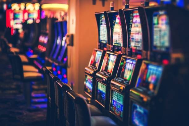 Live-dealer Casino Hold'em table showing community cards and player decision point